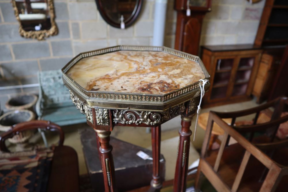 An early 20th century French octagonal marble top jardiniere stand, width 31cm height 80cm